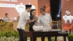Acara Penetapan Nomor Urut Pilkada Batu, Firhando-Rudi Datang Pakai Luxio